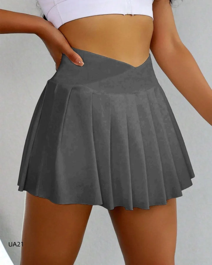 Women dark grey high waist pleated mini skirt with V-shaped waistband, front view