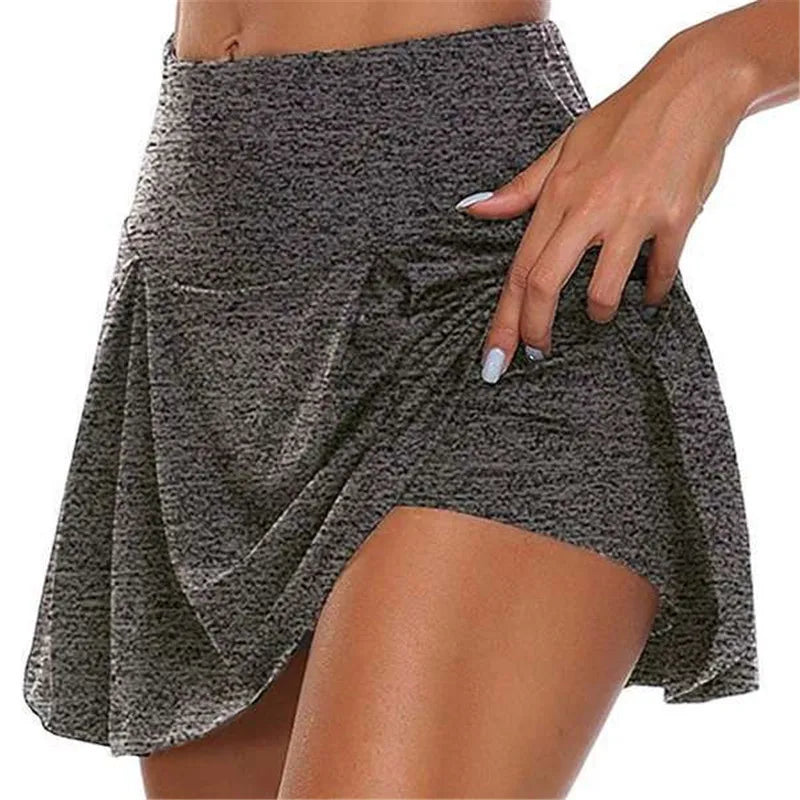 Women gray marl high waisted mini skirt with front pleats and integrated shorts sporty side view