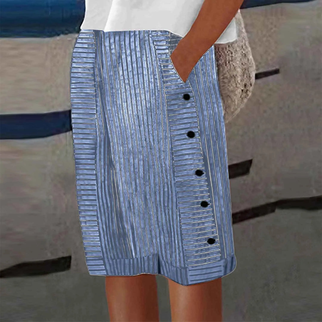Women blue high waist striped shorts with side buttons and functional pocket detailing.
