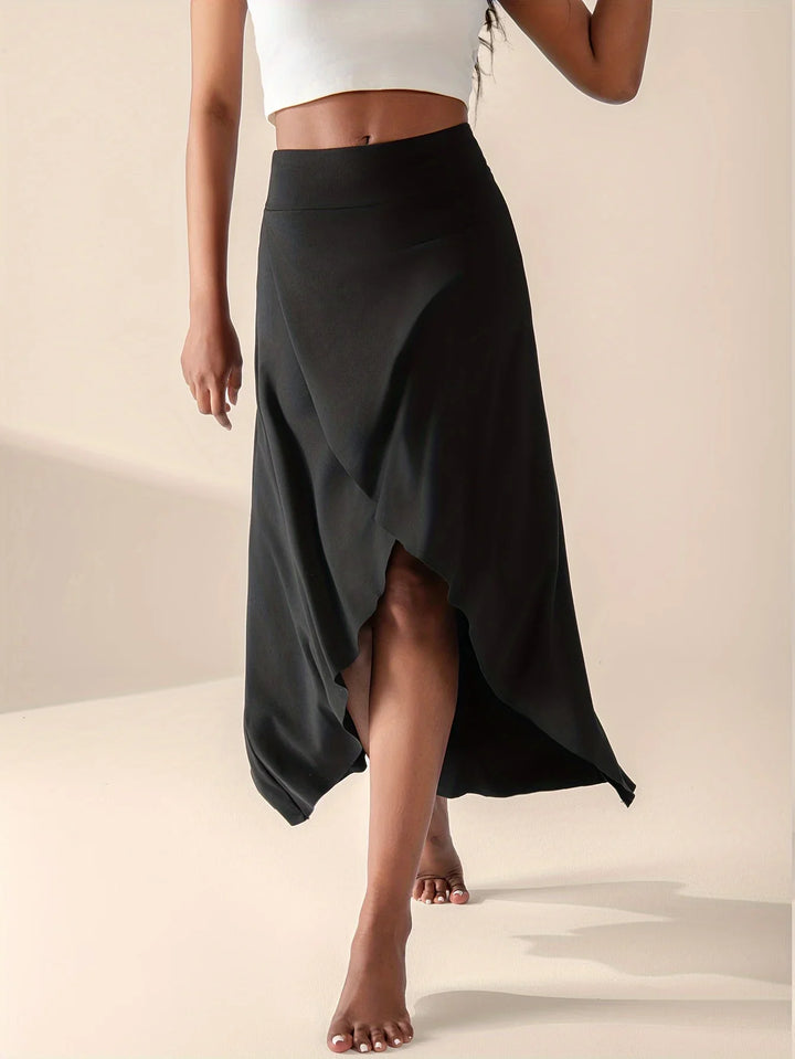 Women black high waisted wrap midi skirt with flared front in motion