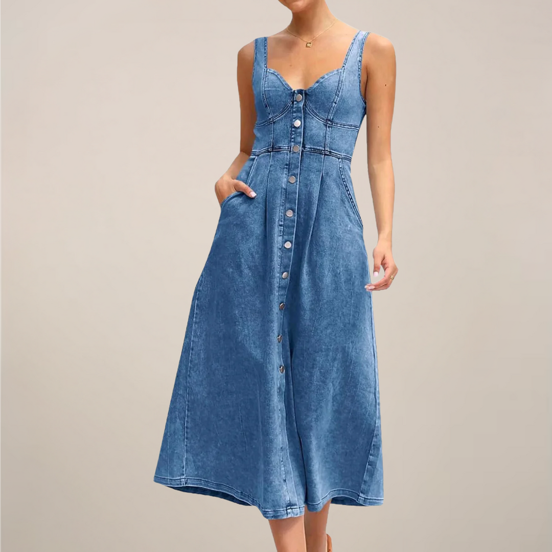 Women darker blue sleeveless denim midi dress with front buttons, side pockets, and flowing skirt