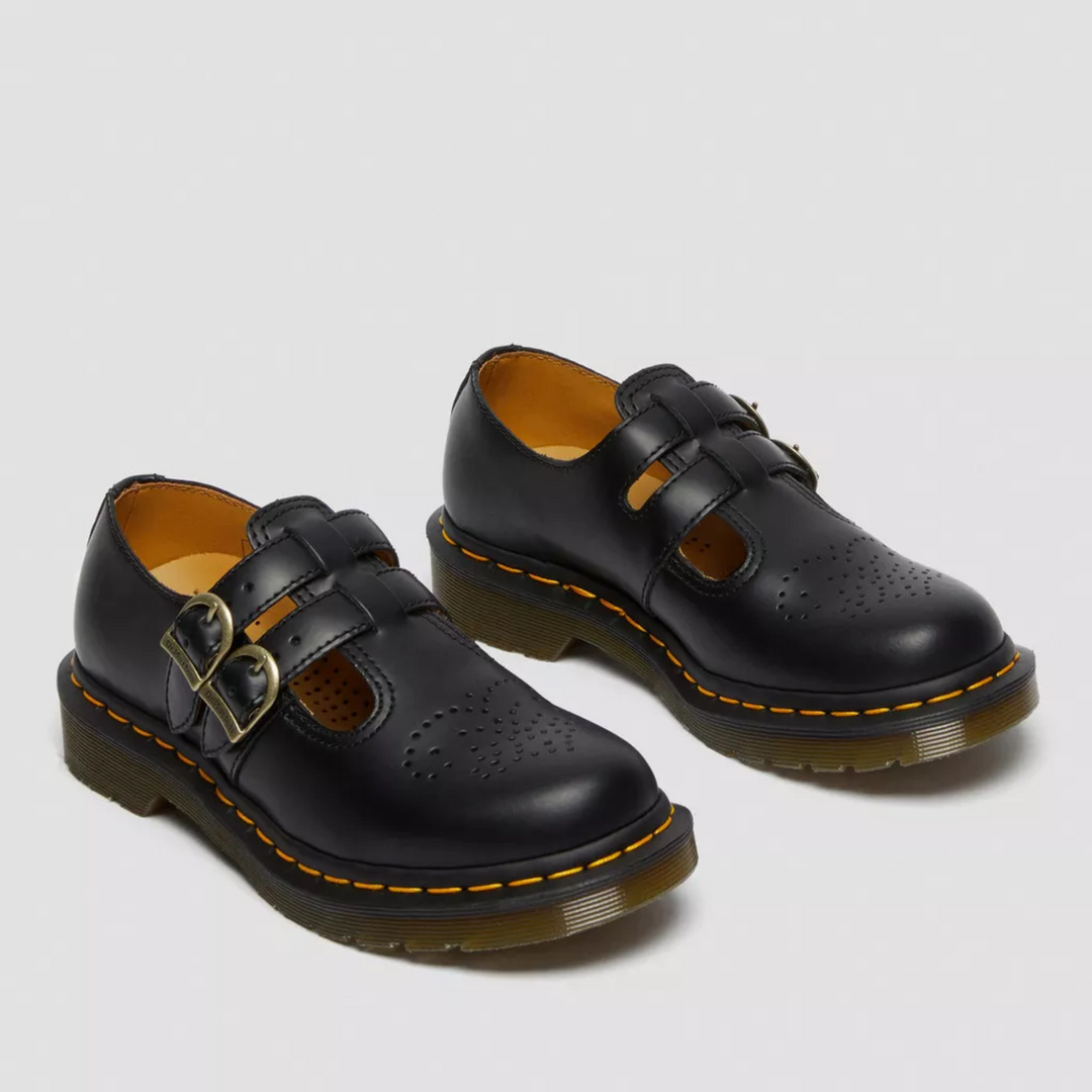 Pair of women black double buckle Mary Janes with rounded toe and low block heel