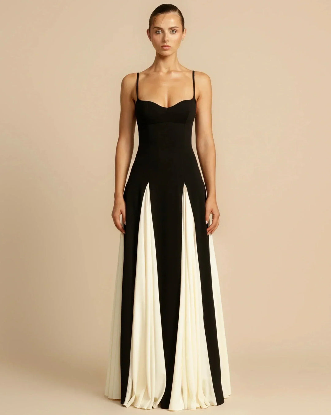 Women black and white sweetheart neck maxi dress with contrasting skirt panels, full front view.