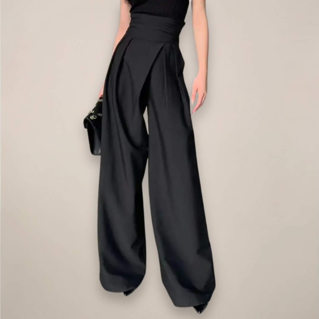 Women black high waisted wide leg slacks with front pleats and wrap detail, front view.