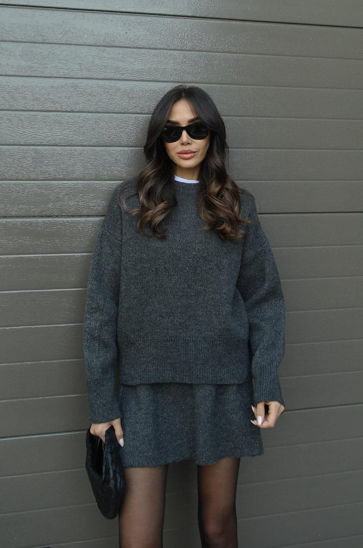 Women charcoal gray knit long sleeve sweater and mini skirt set, front view
