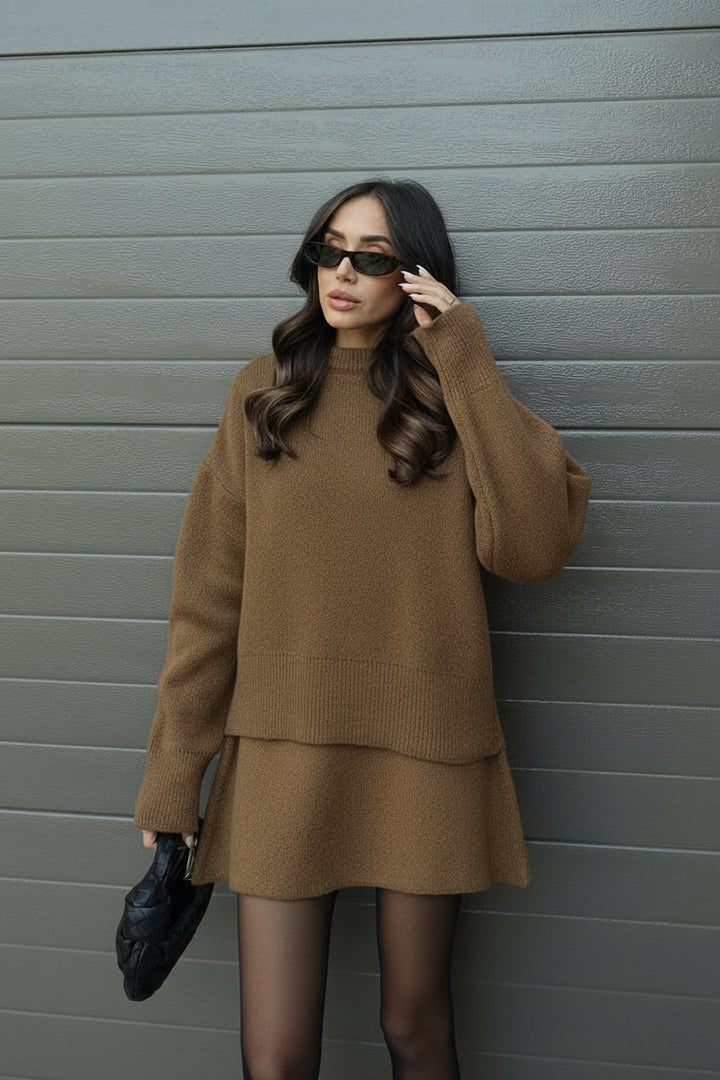 Women brown knit long sleeve crew neck sweater and mini skirt set, slightly angled view
