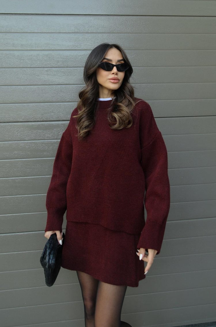 Women burgundy knit long sleeve crew neck sweater and mini skirt set, front view