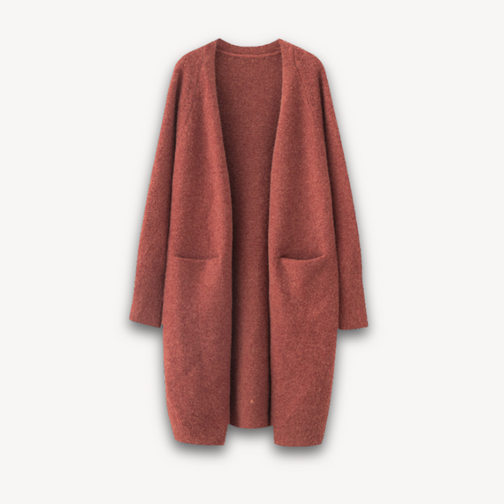 Women rust colored long open front knit cardigan with two front pockets and smooth knit texture