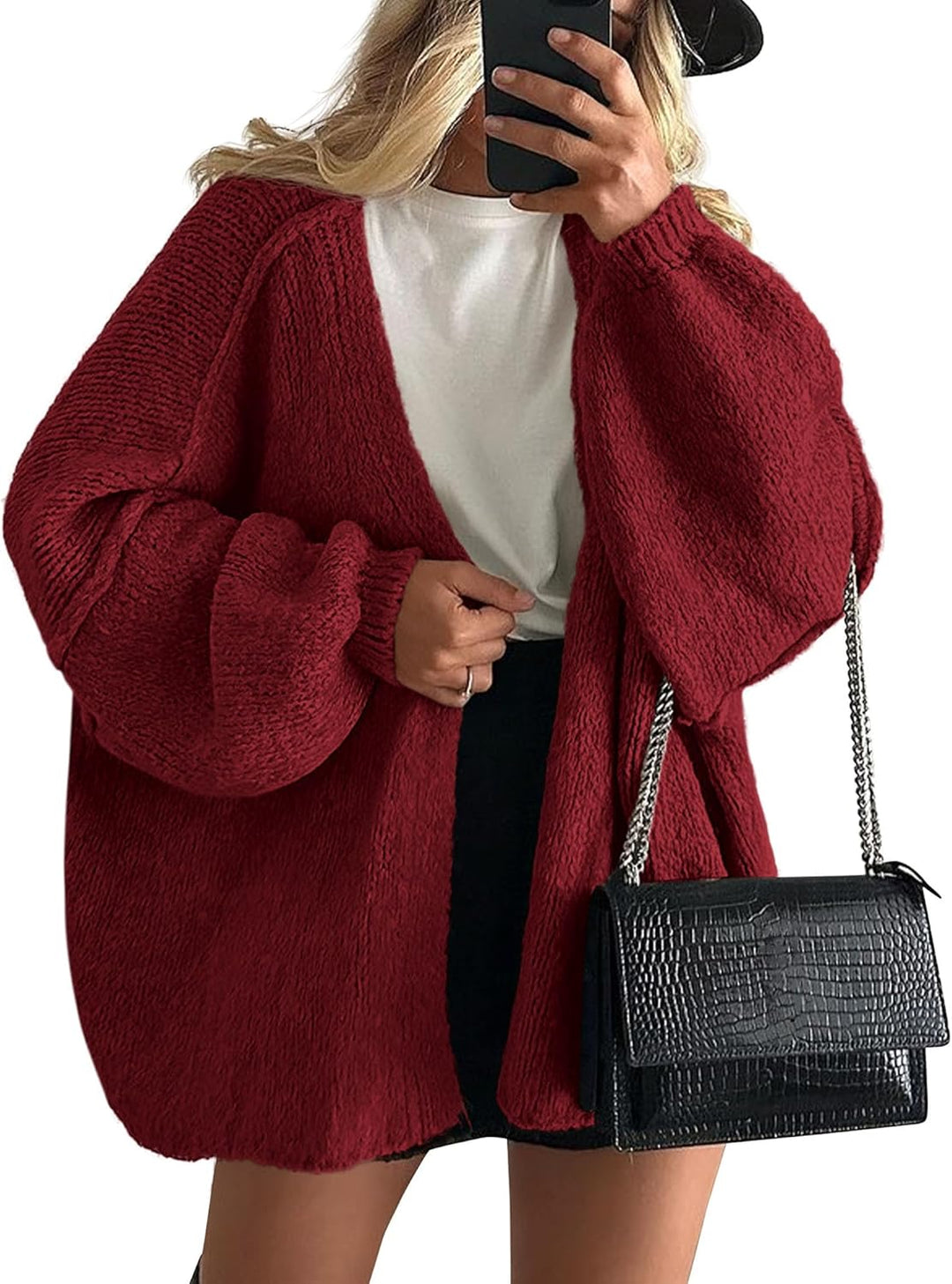 Women red open front knit cardigan with voluminous long sleeves and fitted cuffs, front view