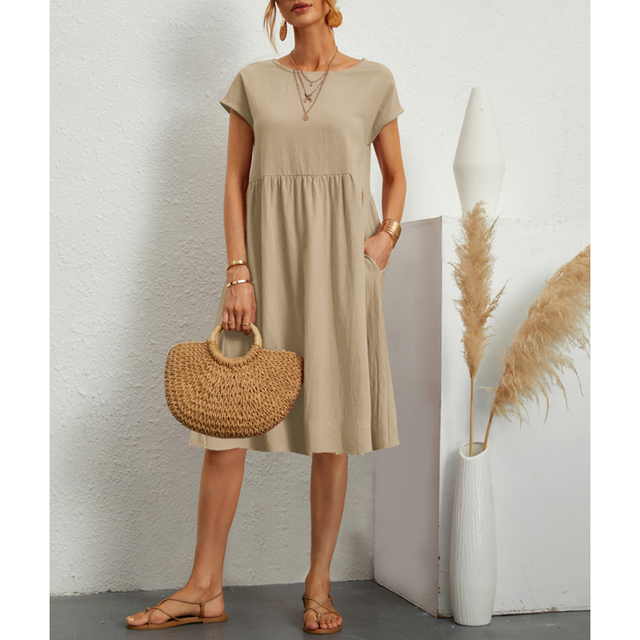 Women beige short sleeve crew neck midi dress with gathered waist and pockets, front view