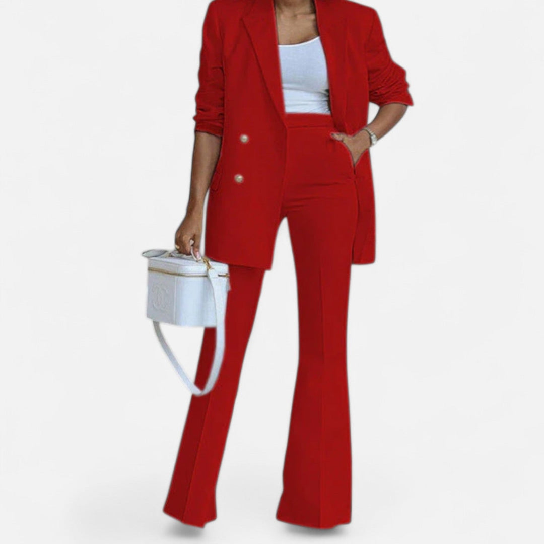 Women's red double breasted blazer and high waist flared pants set, angled view.
