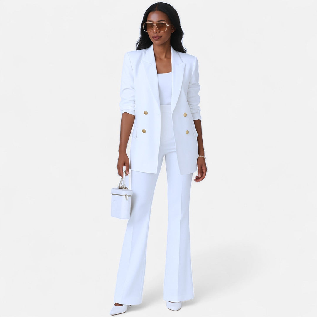 Women's white double breasted blazer and high waist flared pants set, front view.