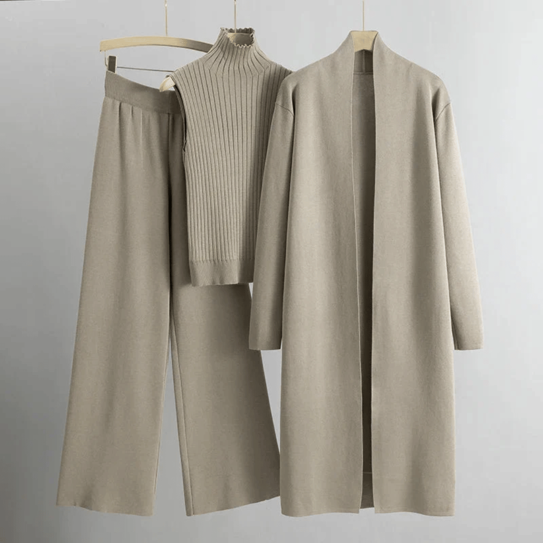 Women beige ribbed knit three piece set with open cardigan, mock neck top, and wide leg pants