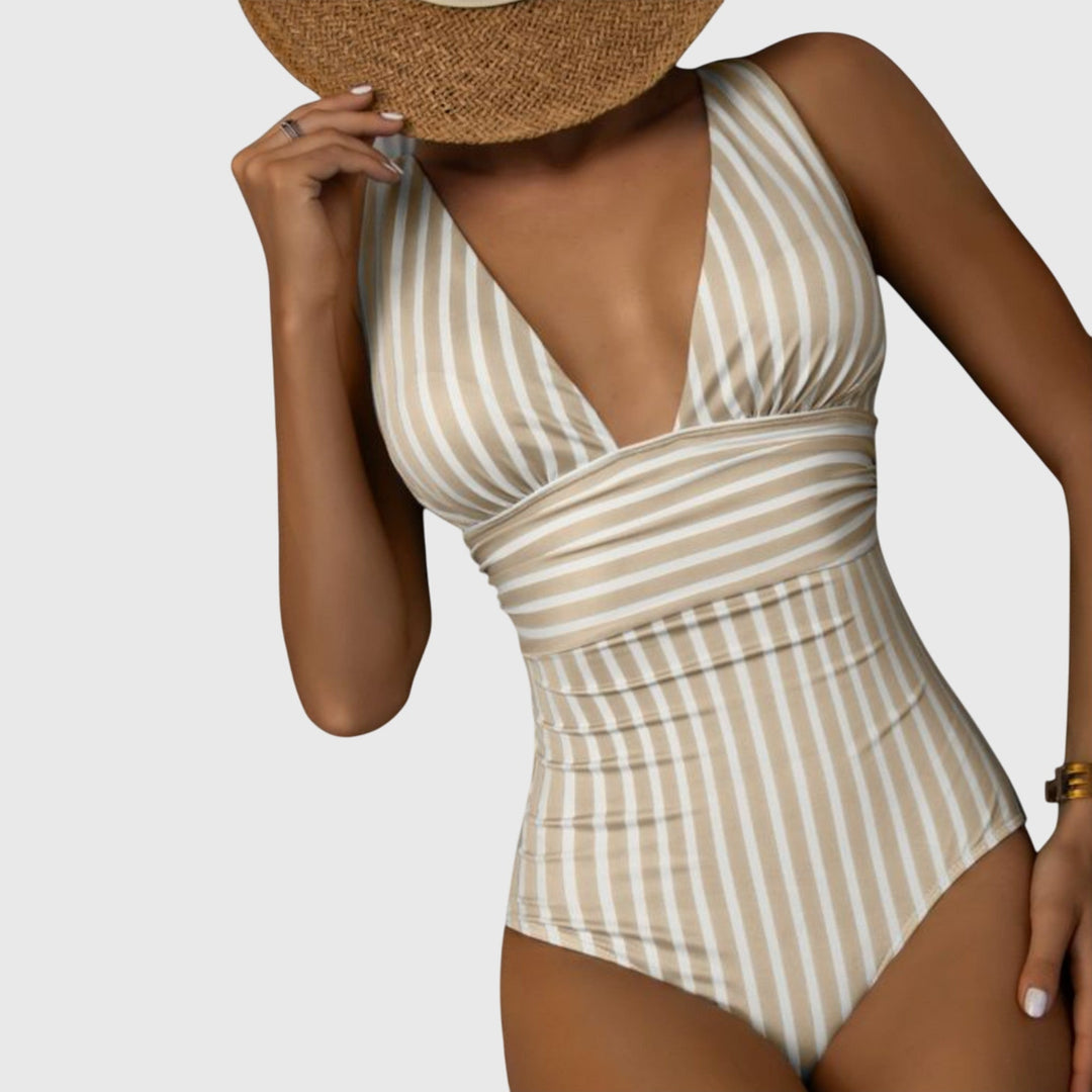 Beige and white striped v-neck one-piece swimsuit with ruched waist detail