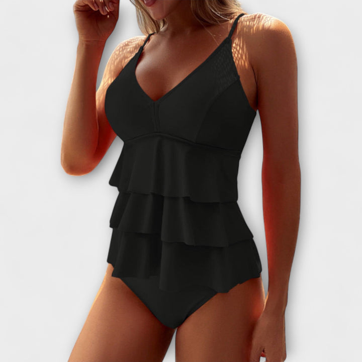Black ruffled v-neck one-piece swimsuit with layered ruffle skirt