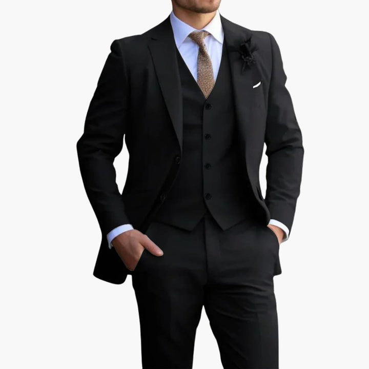 Black three-piece formal suit with notched lapel jacket and vest on model