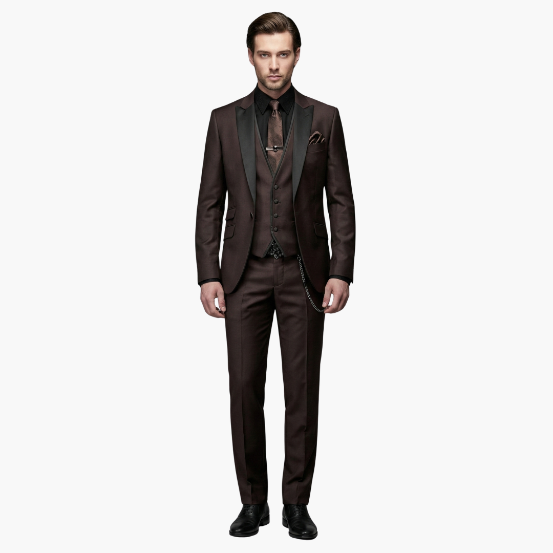 Full-length brown formal three-piece suit with vest and chain accent for weddings