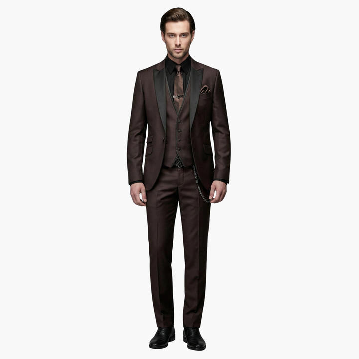 Full-length brown formal three-piece suit with vest and chain accent for weddings
