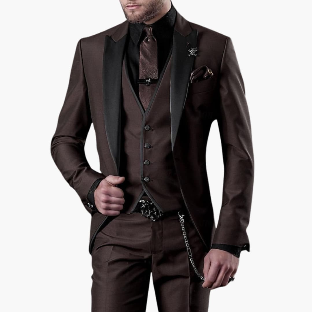 Brown three-piece suit with notch lapel blazer, vest, and matching trousers with chain detail