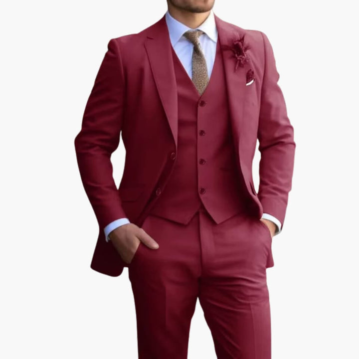 Burgundy three-piece formal suit with vest and notched lapel jacket on model