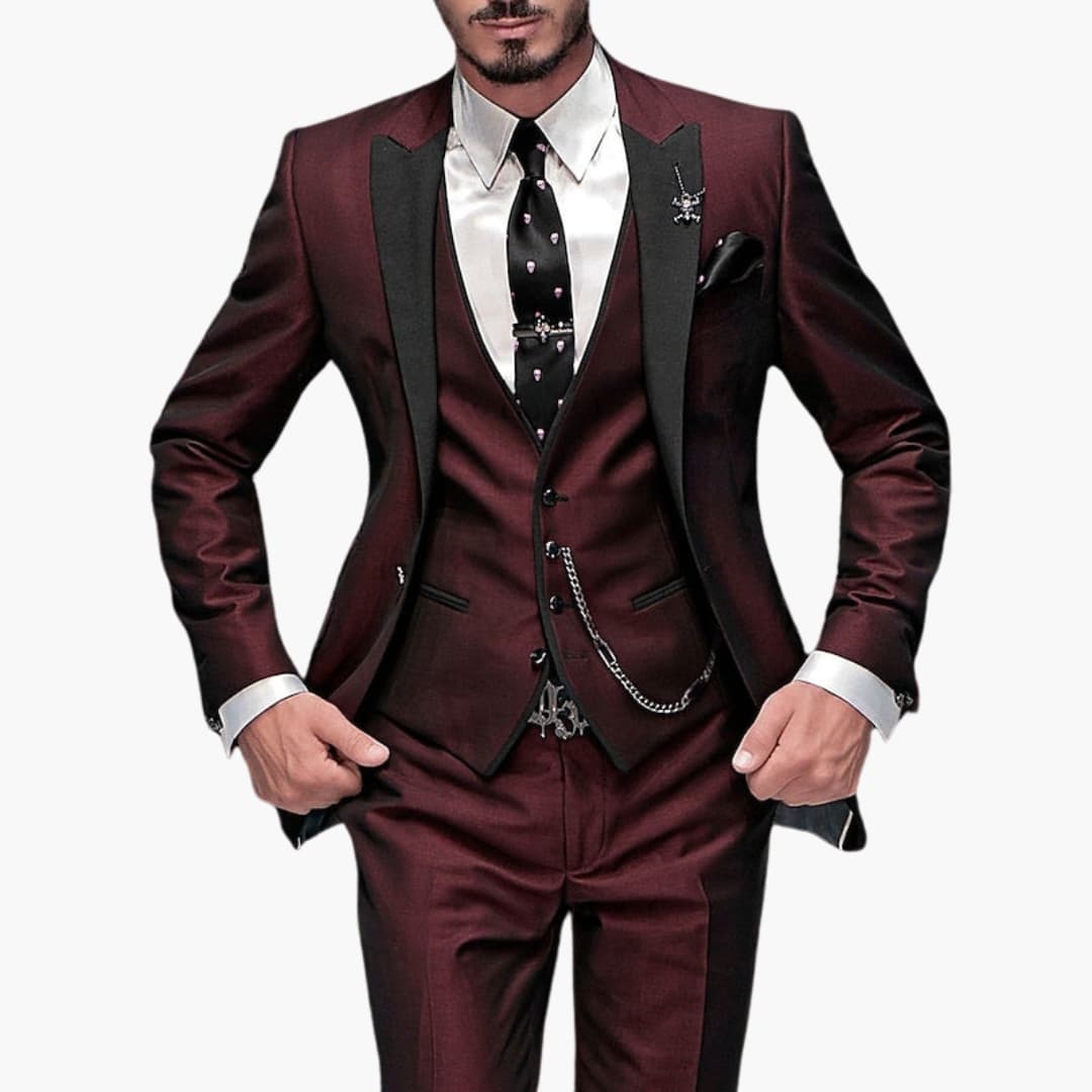 Burgundy three-piece suit with black vest and notch lapel blazer for formal wear