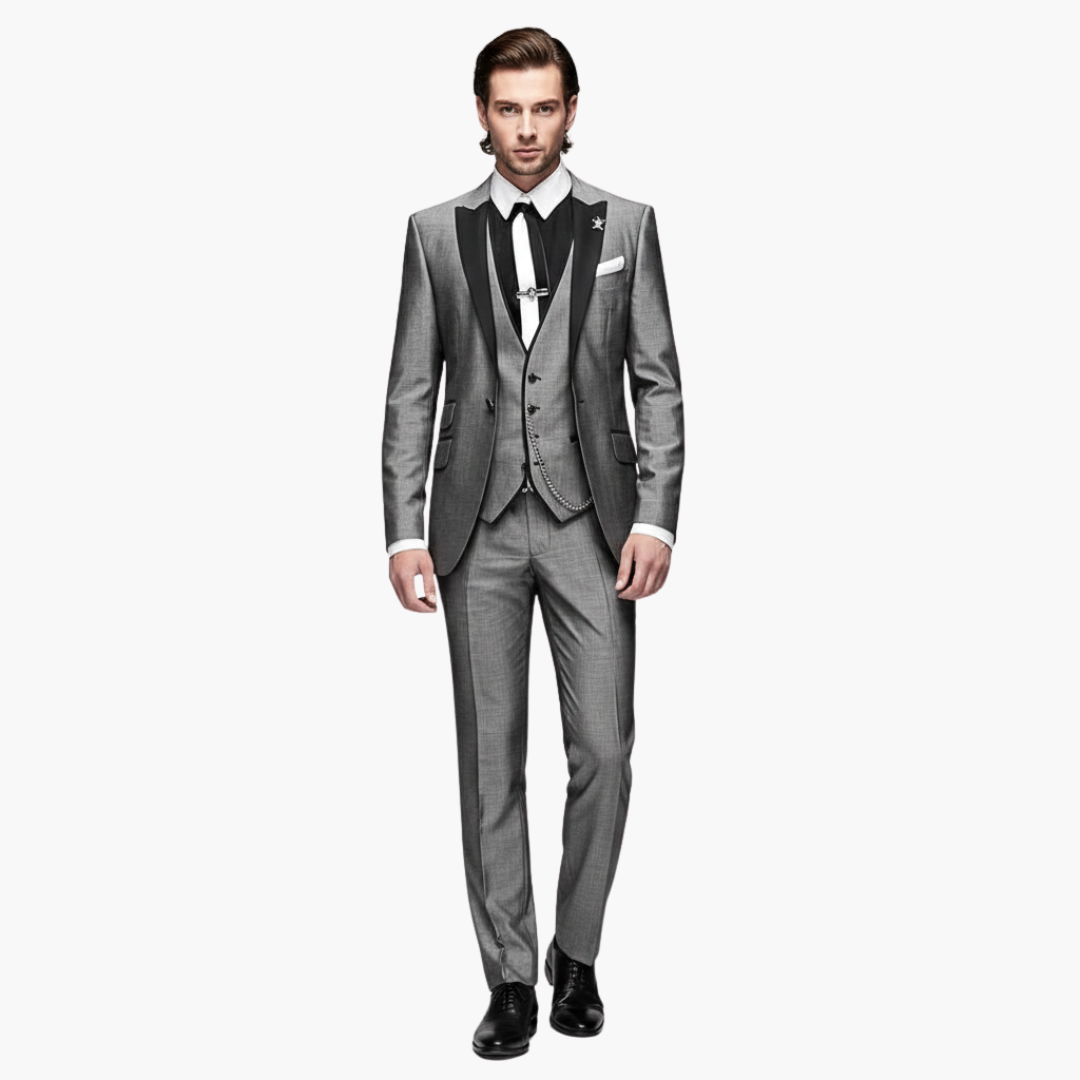 Full-length charcoal gray formal suit with black vest and white dress shirt front view