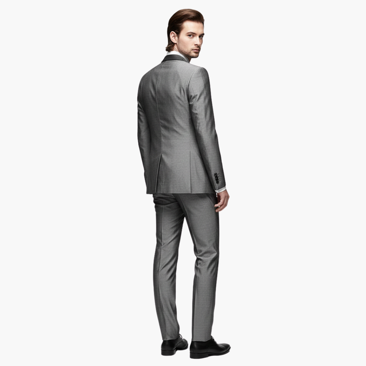 Back view of charcoal gray suit jacket with notch lapels and tailored fit