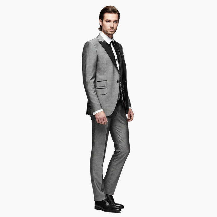 Charcoal gray three-piece suit side profile showing notch lapel blazer and vest