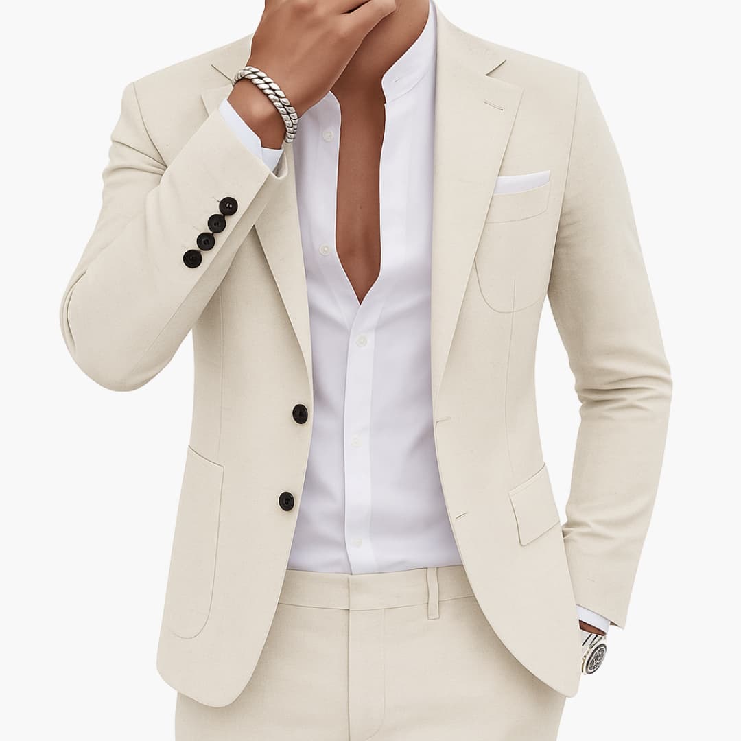 Cream two-piece suit with notched lapel blazer, black buttons, and straight-leg pants