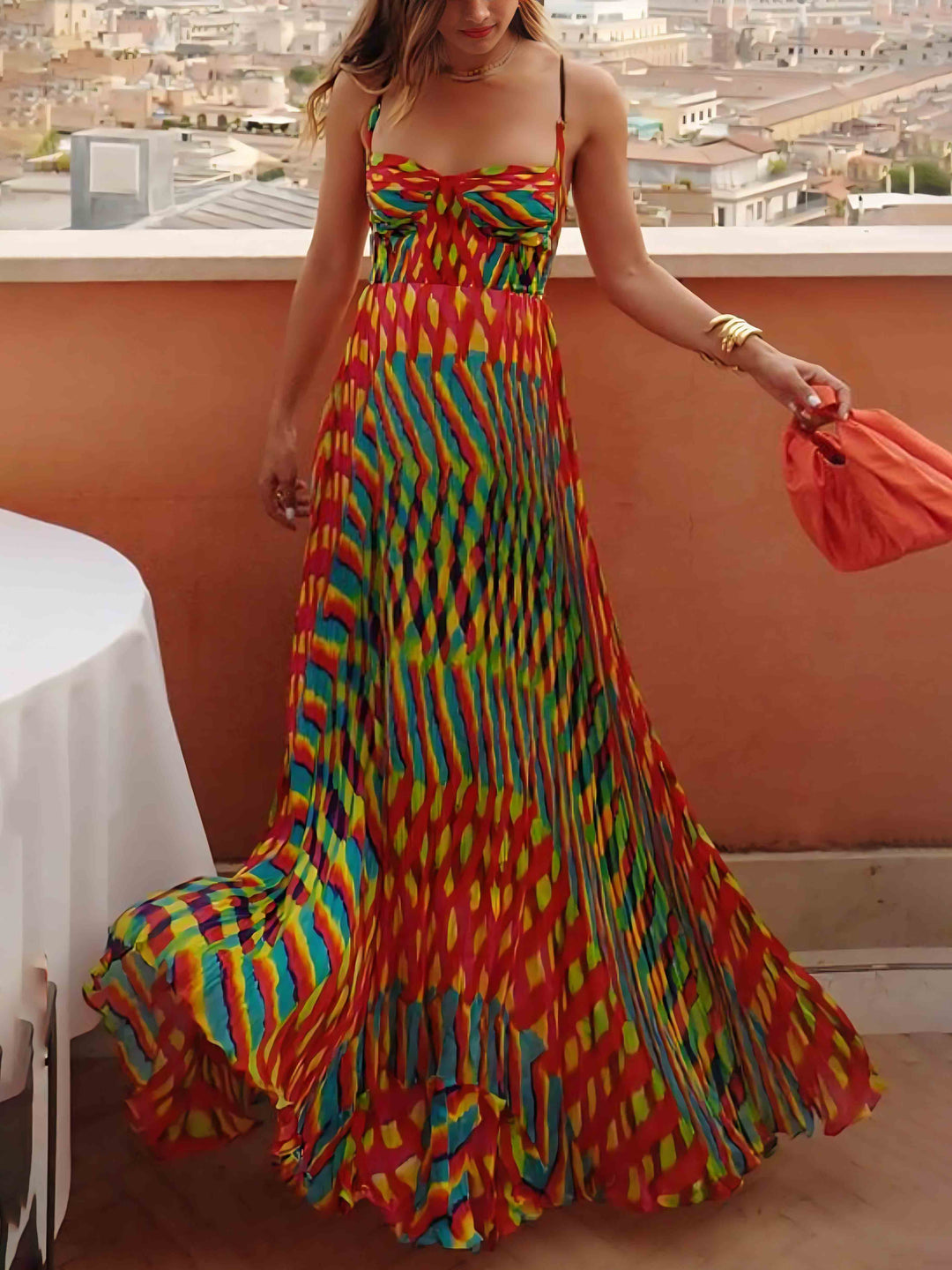 Women multi-color geometric print maxi dress, sweetheart neckline and spaghetti straps, front view walking pose