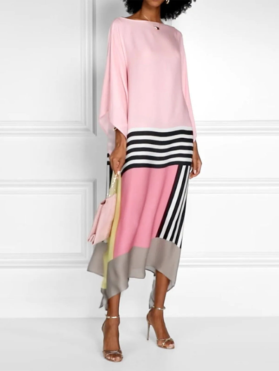 Women pink, black, white, yellow color block midi dress with batwing sleeves, front view