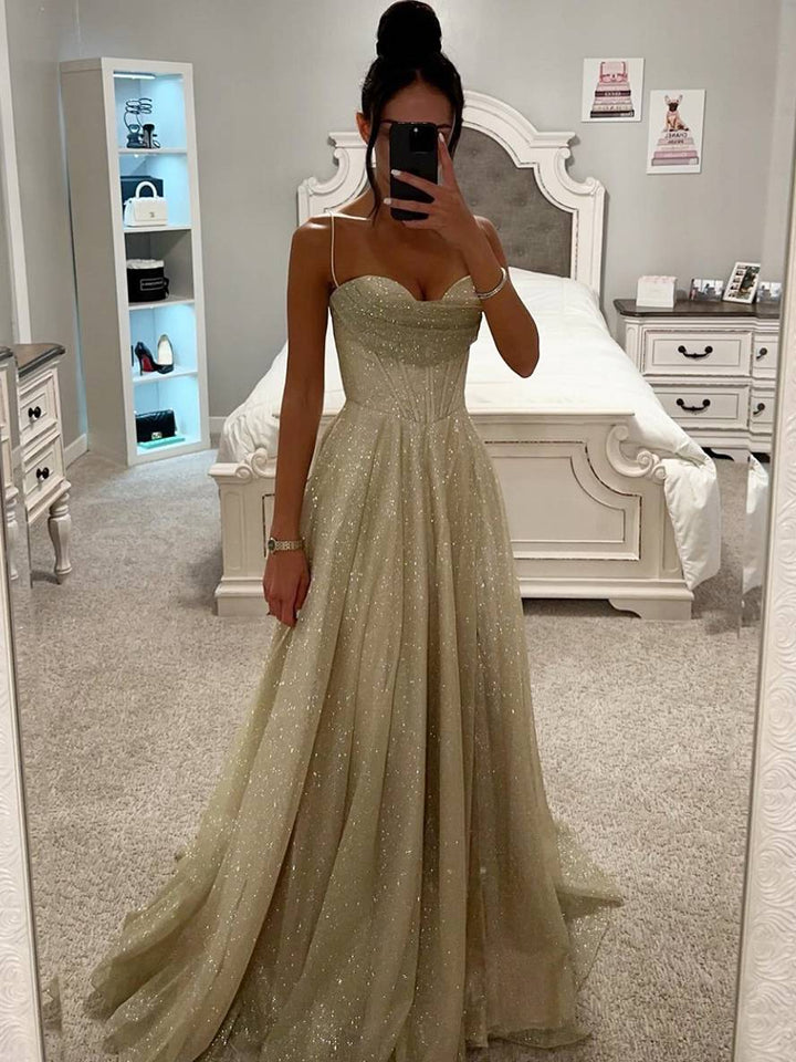 Women champagne sweetheart neck spaghetti strap maxi dress with shimmer details, full view.