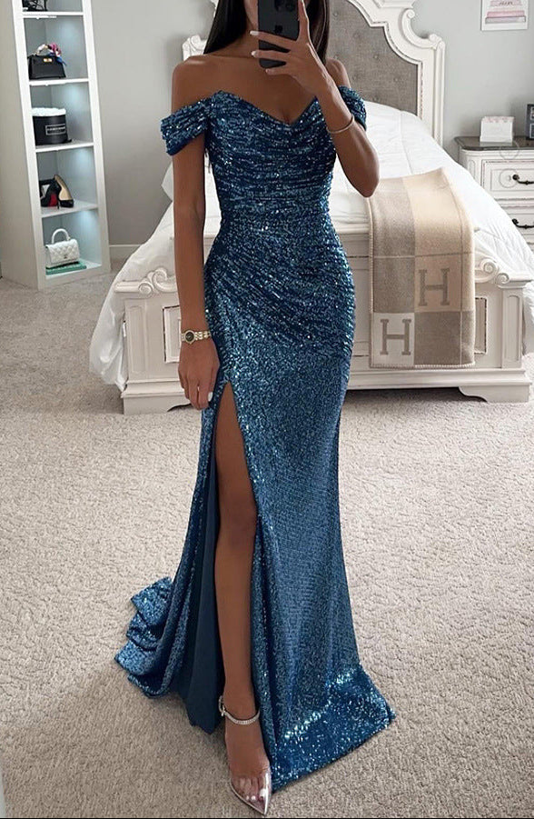 Women blue sequin maxi dress with off-shoulder design and side leg split, standing pose