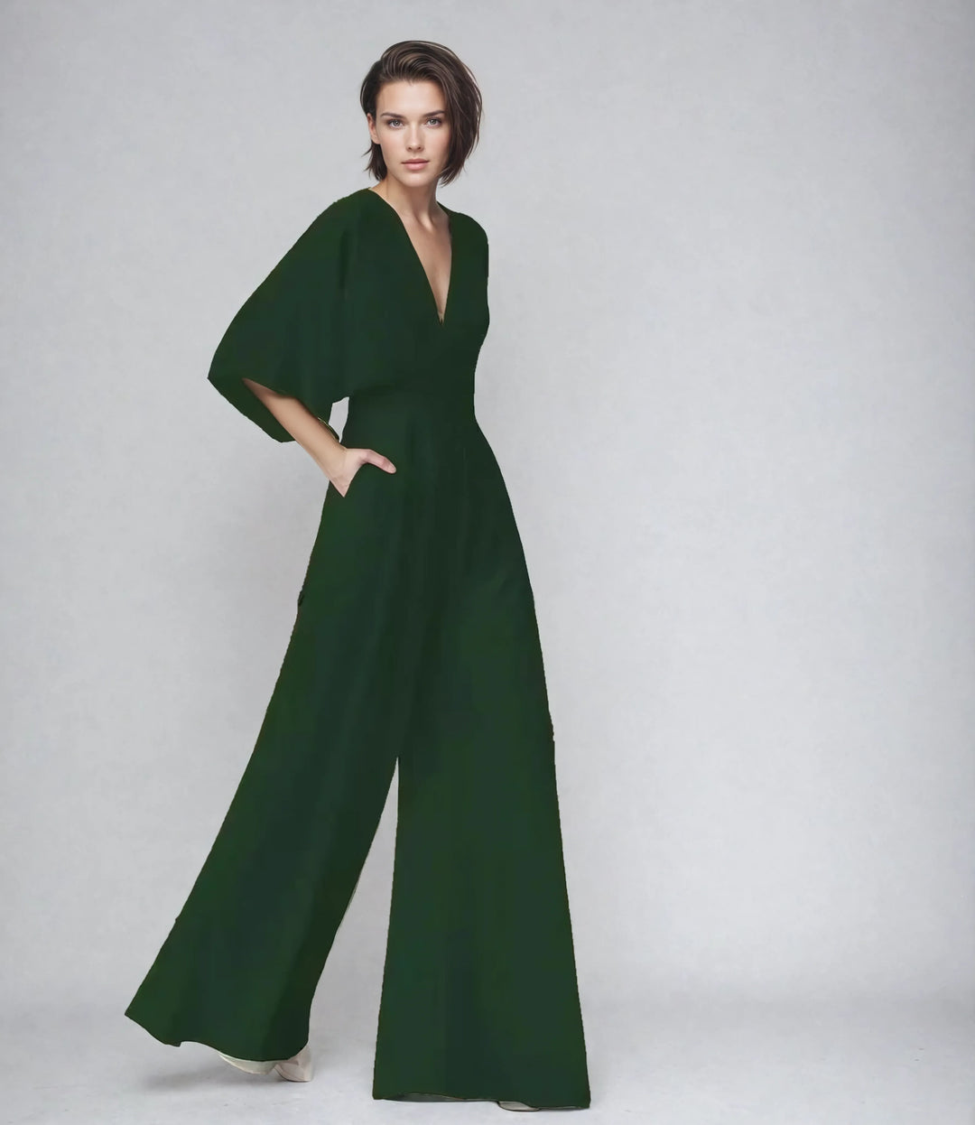 Women green V neck butterfly sleeve jumpsuit with wide trousers and side pockets modeling