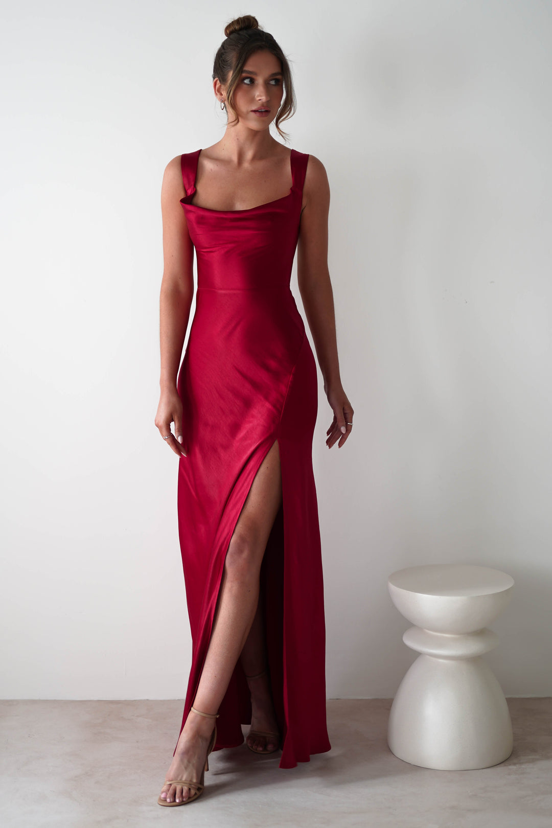 Women red satin cowl neck maxi dress with a thigh-high side slit, front view.