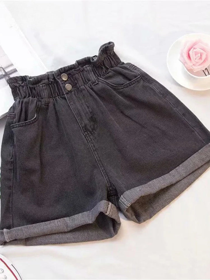 Women dark gray denim shorts featuring an elasticated high paperbag waist and turned-up cuffs.