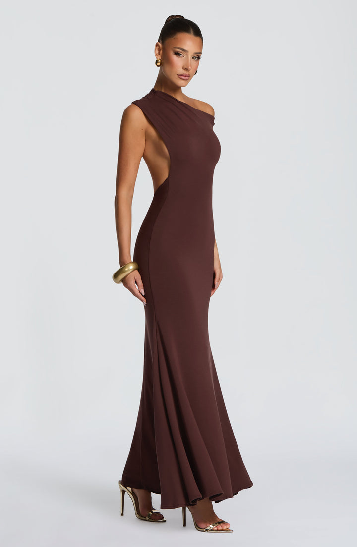 Women plum brown backless one shoulder maxi dress with gold cuff detailing, front view