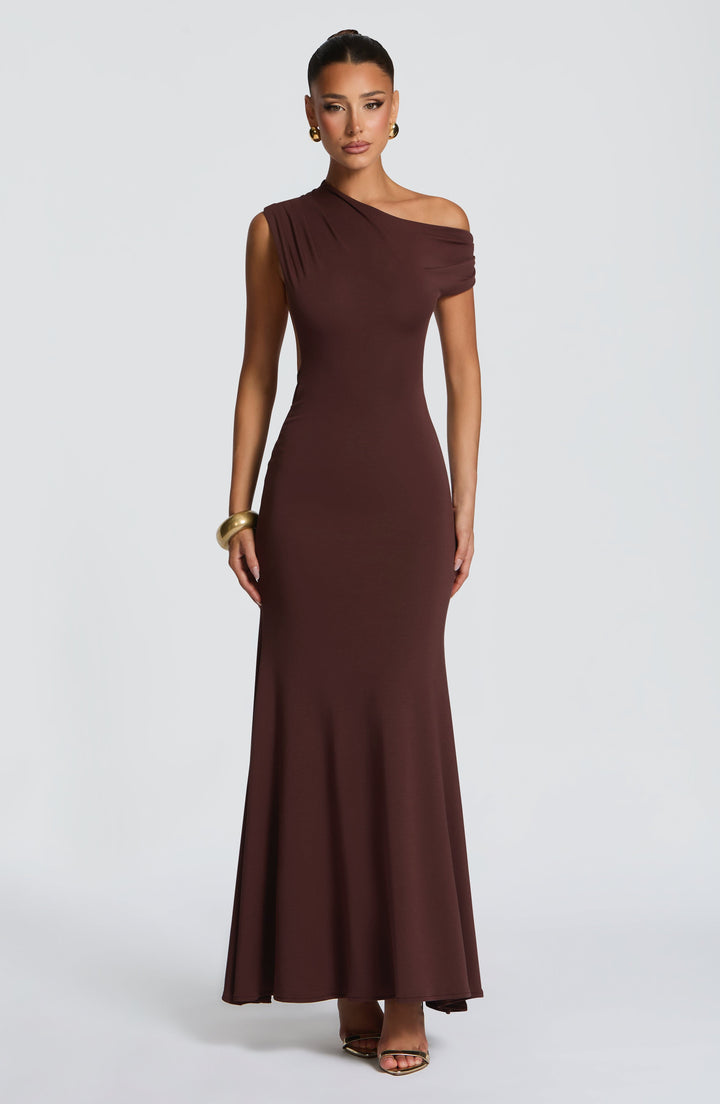 Women plum brown one shoulder maxi dress with draped neckline and bodycon fit, front view