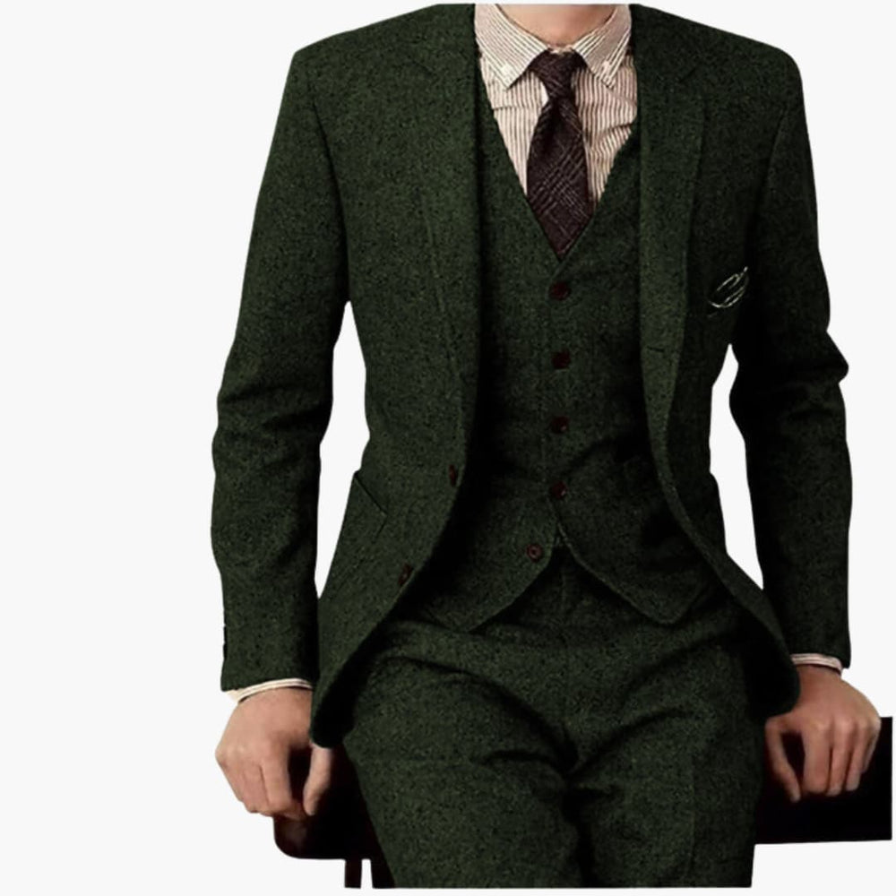 Men's forest green tweed formal wedding suit showcasing notch lapel blazer and matching vest from front angle