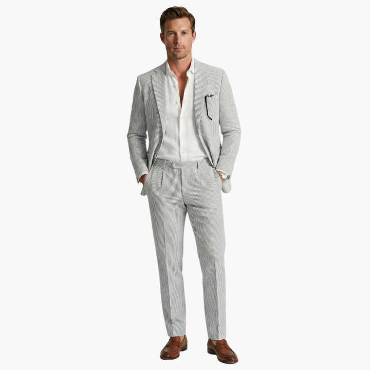 Gray pinstripe two-piece suit with pleated trousers and white shirt
