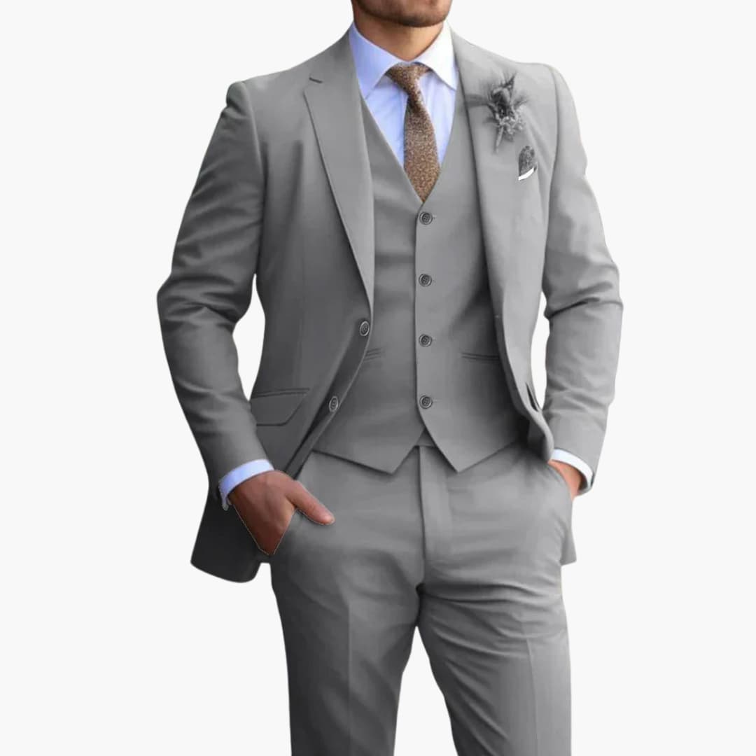 Gray three-piece formal suit with vest and notched lapel jacket on model
