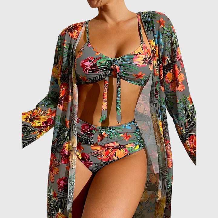 Gray tropical floral bikini set with ruched bikini top and high-waist bottoms with flowing cover-up