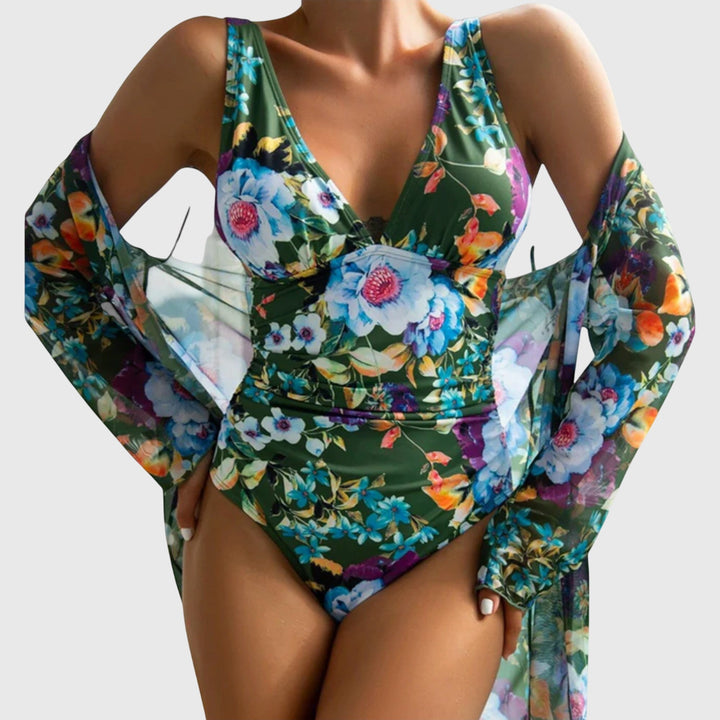 Green floral one-piece swimsuit with long-sleeve wrap, colorful botanical print front view