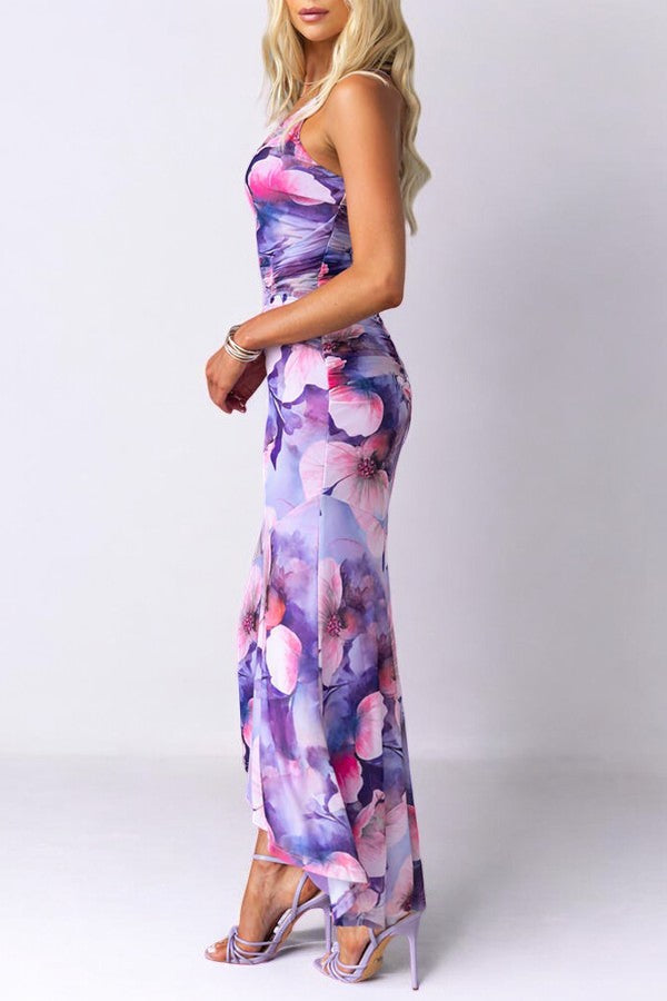 Women purple floral maxi dress with one shoulder design, profile view.