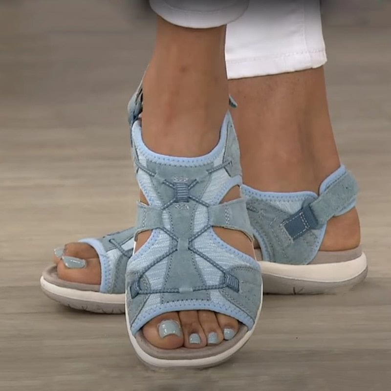 Women's light blue open-toe sandals with adjustable straps from a front view