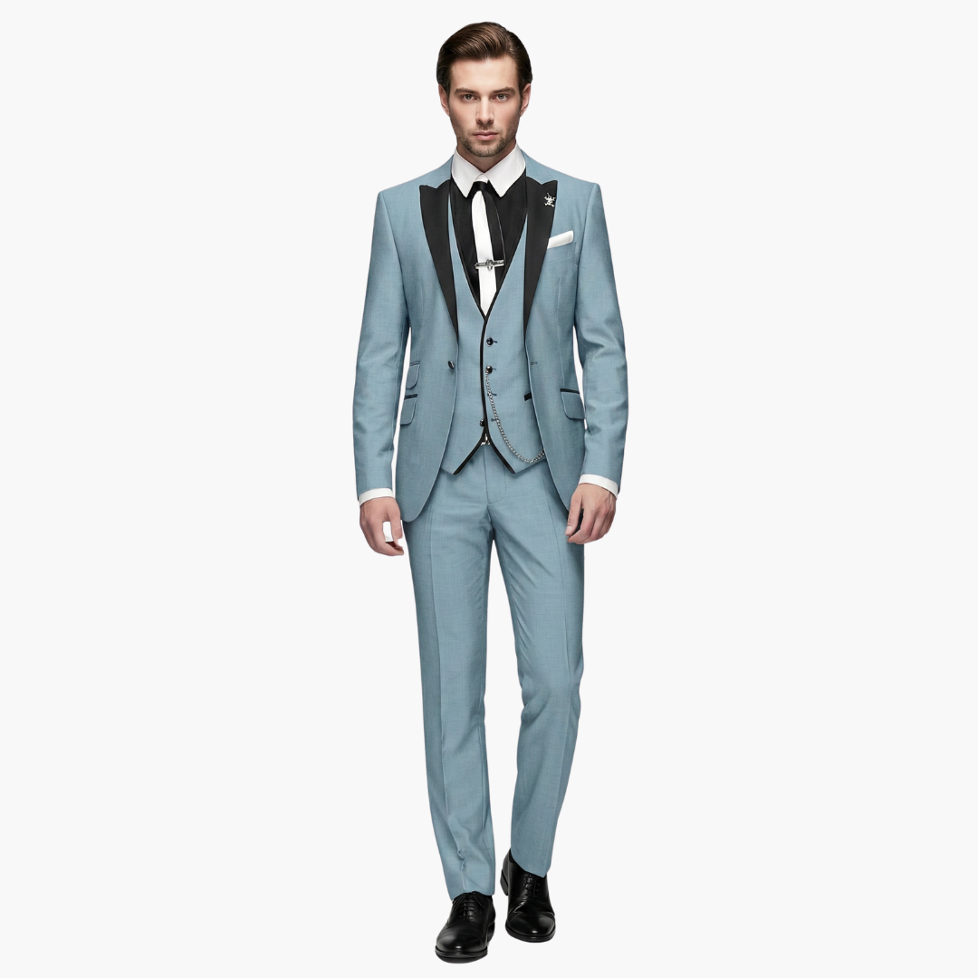 Light blue formal three-piece suit with black contrast vest and chain accent