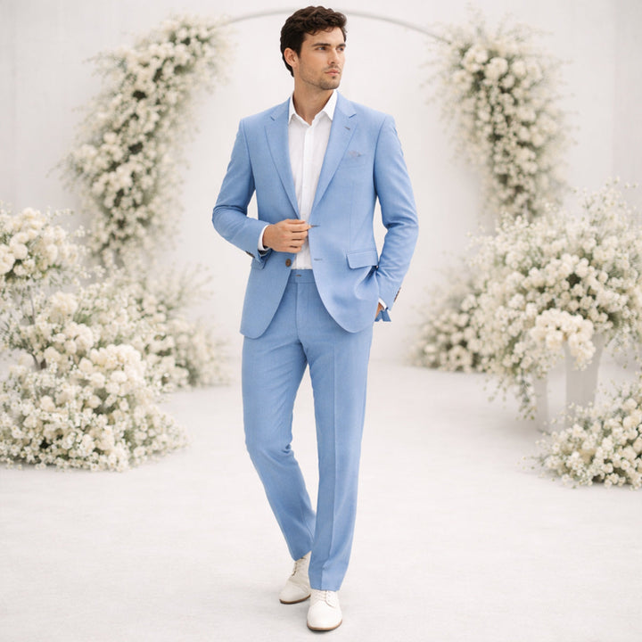 Light blue linen suit man with white dress shirt in formal setting