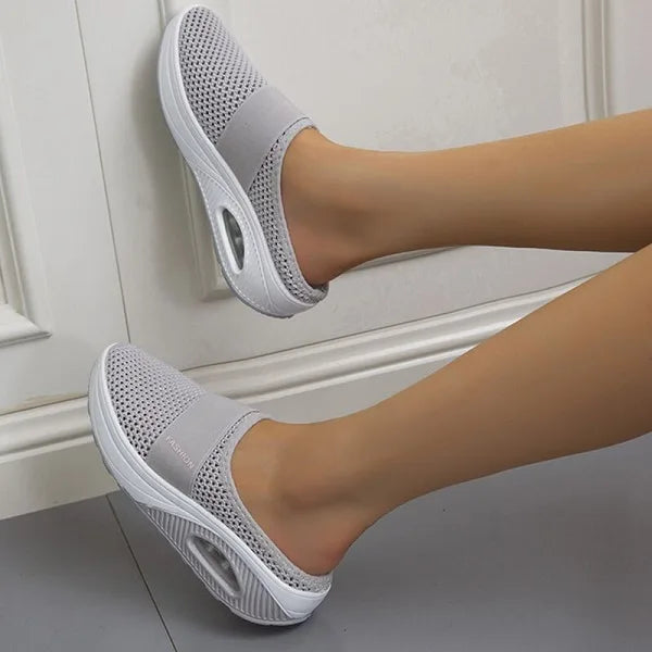 Women light gray mesh slip-on mule walking shoes with white sole and visible air cushion