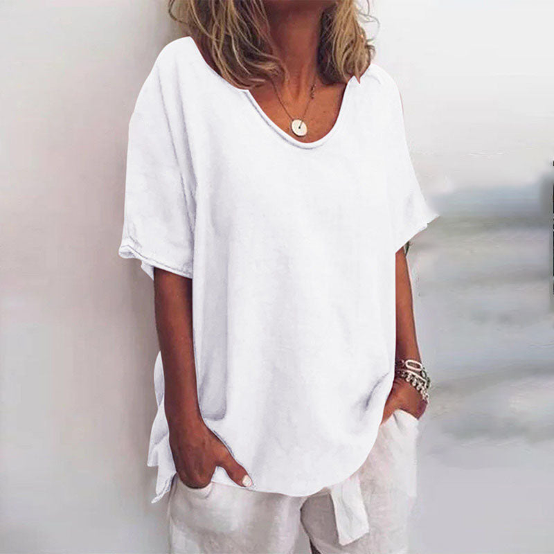 Women white loose fit V neck t-shirt with short sleeves and rounded hem, front view.