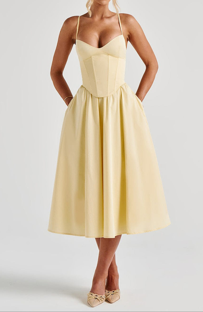 Women's light yellow sweetheart corset midi dress with spaghetti straps, front view